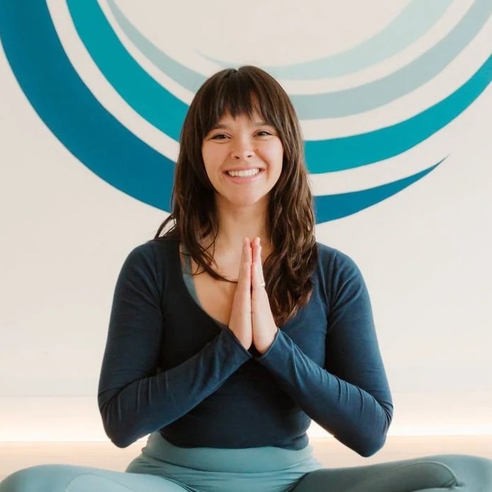 Annela Villena Flores seated in Union’s studio